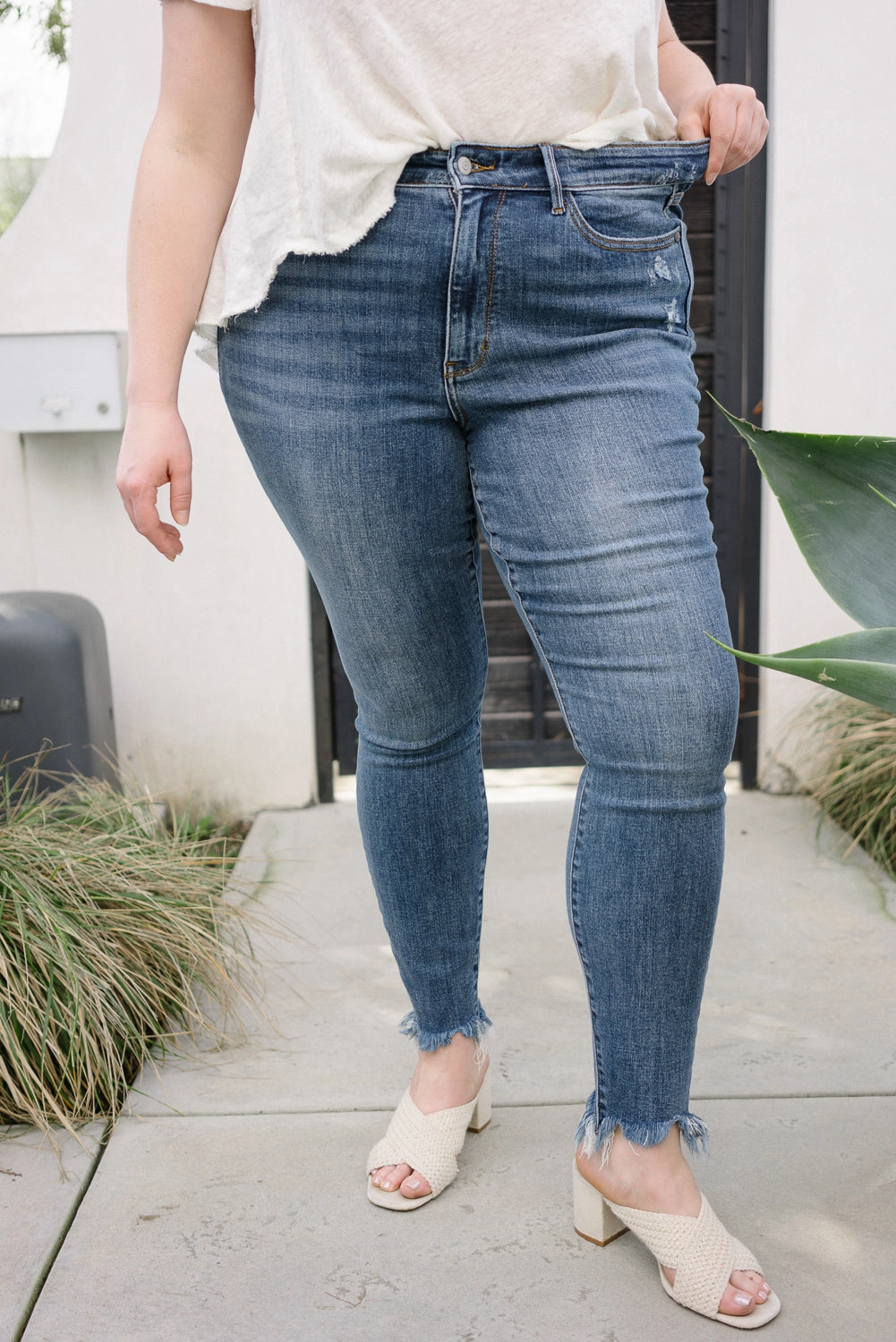 Dessarie High Rise Skinny with Distressed & Shark Bit Hem - PLUS