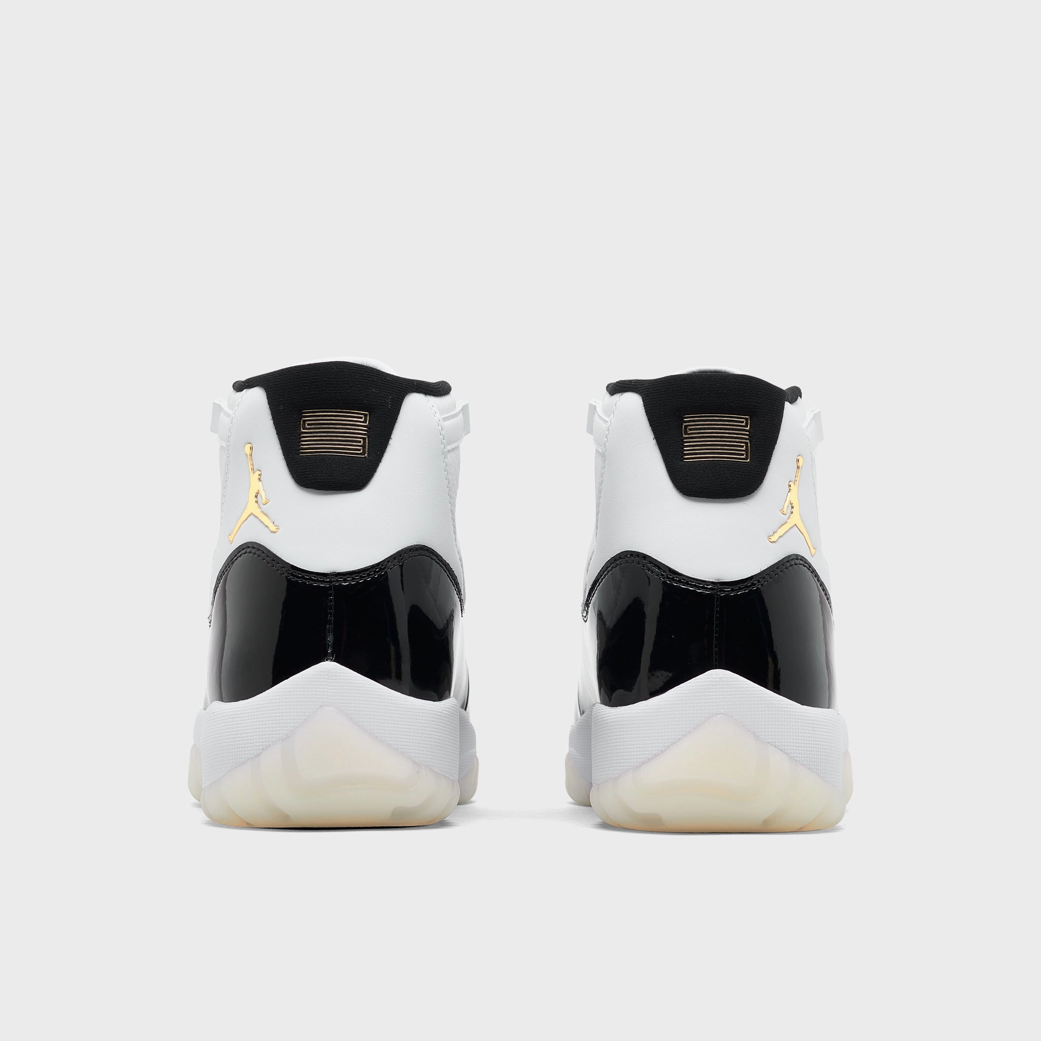 Jordan 11 Retro White / Metallic Gold - Black