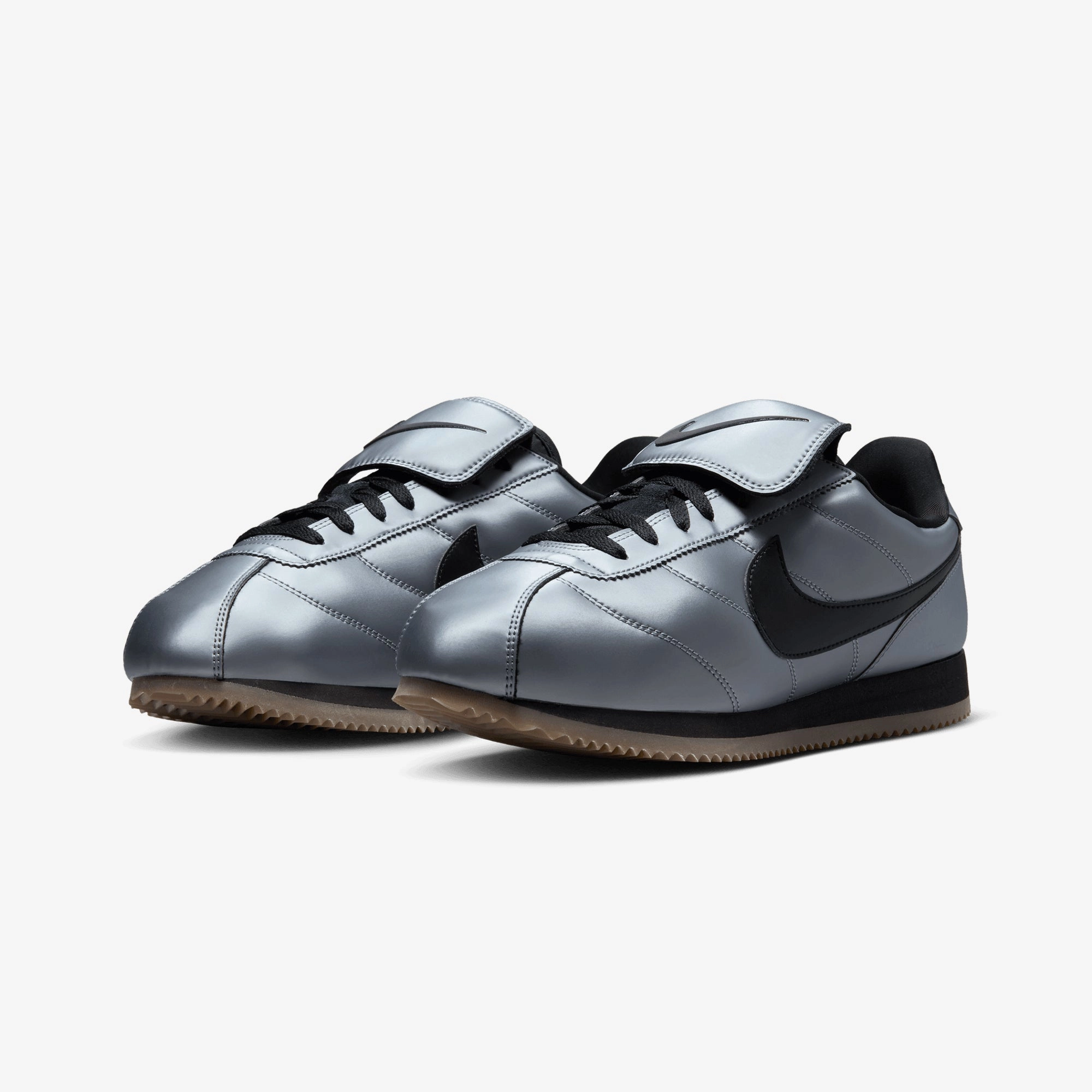 NIKE | CORTEZ { MTLC COOL GREY/BLACK-GUM DARK BROWN