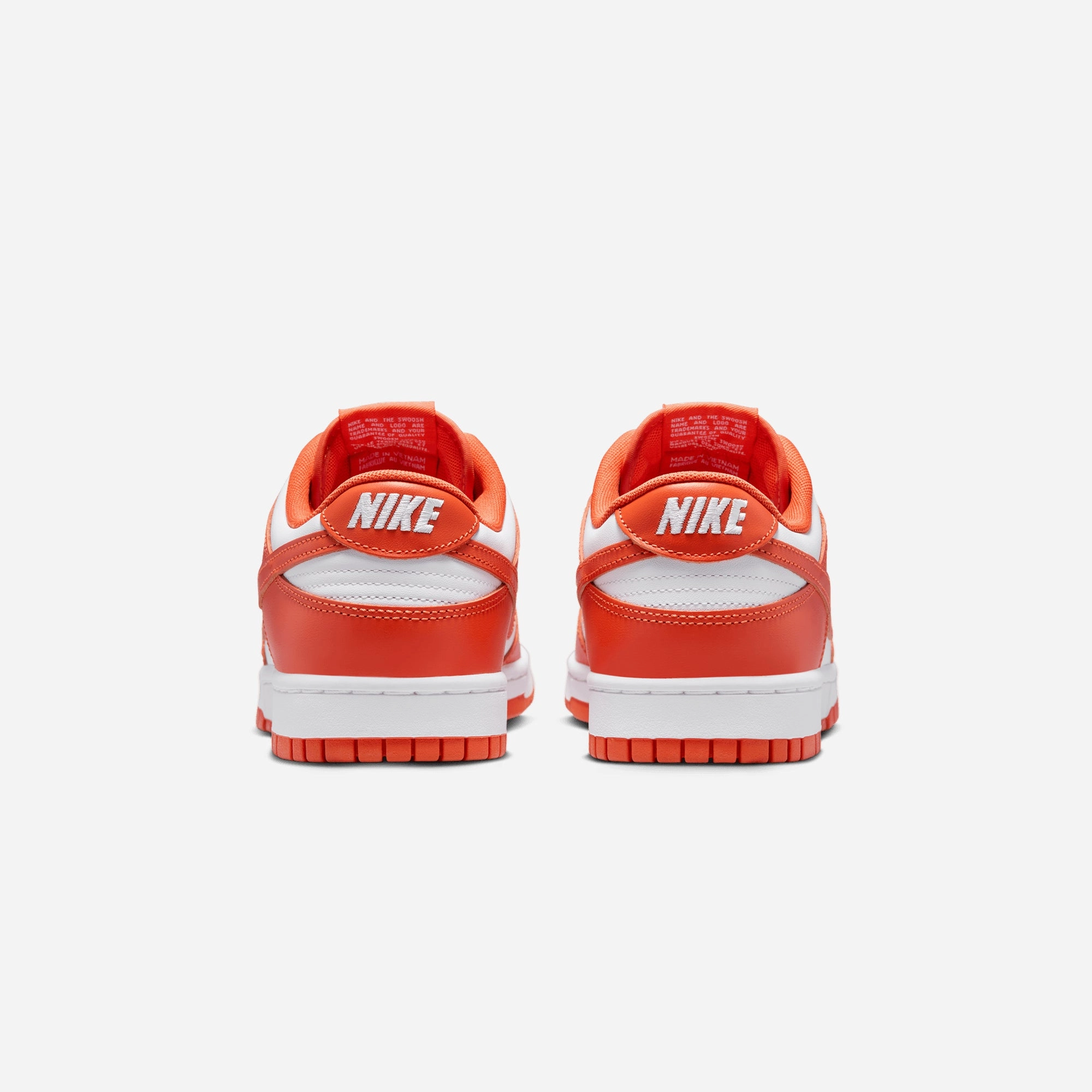 NIKE | DUNK LOW RETRO  { WHITE/COSMIC CLAY-WHITE