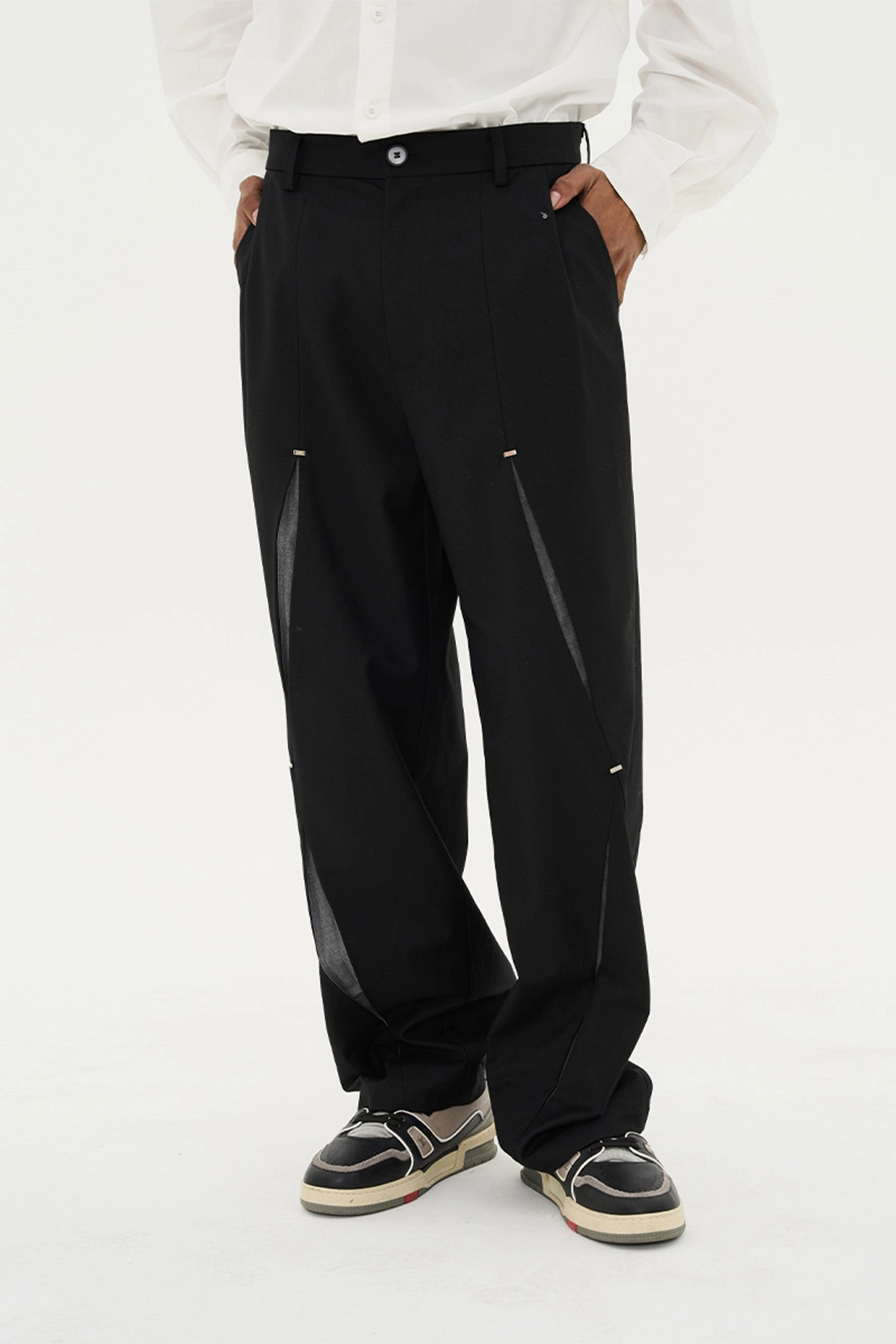 Three-dimensional cut ripped deconstructed patchwork metal button trousers