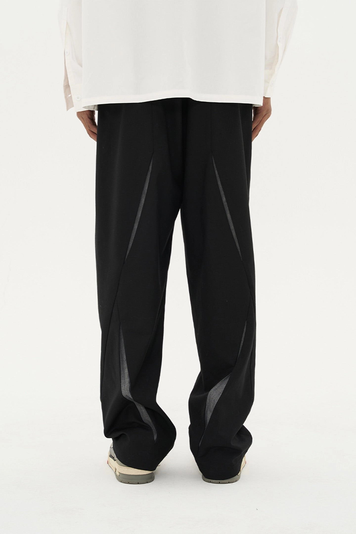 Three-dimensional cut ripped deconstructed patchwork metal button trousers