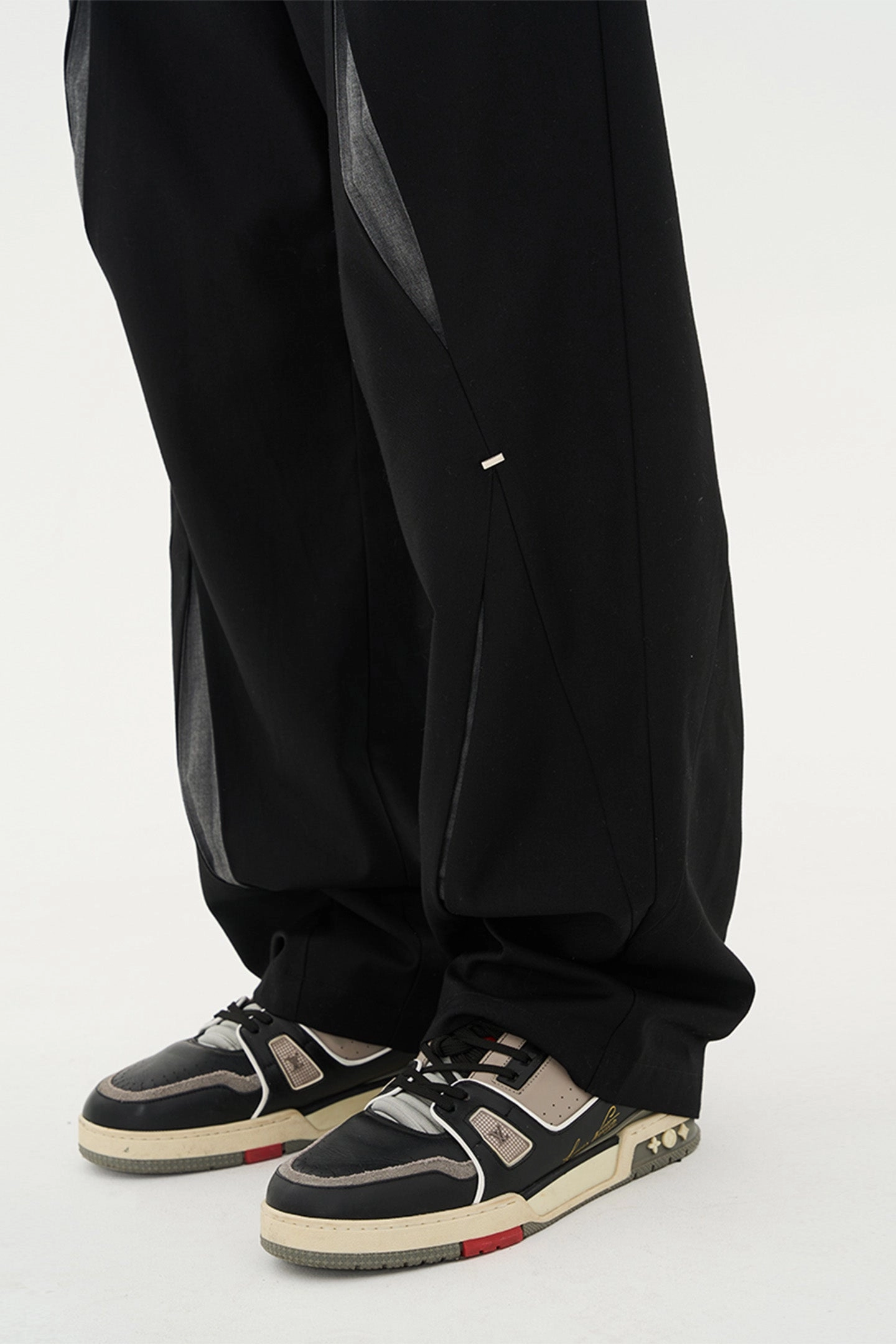 Three-dimensional cut ripped deconstructed patchwork metal button trousers